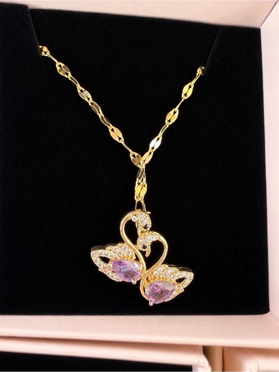 Jewelry - Gold-Tone Plated Swan Necklace with Purple Crystal Accents